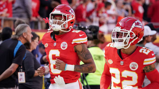 Oct 12, 2023; Kansas City, Missouri, USA; Kansas City Chiefs safety Bryan Cook (6) and cornerback Trent McDuffie (22) take the field for warm ups against the Los Angeles Chargers prior to a game at GEHA Field at Arrowhead Stadium. Mandatory Credit: Denny Medley-USA TODAY Sports  